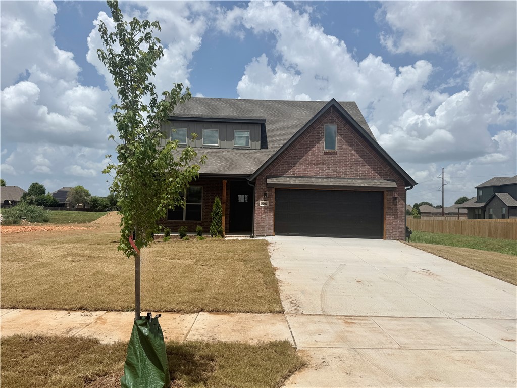Our newest plan!  This south facing 4- bedroom (2 up and 2 down), 3 full bath home, with a bonus room features 3 cm quartz counters, upgraded tile, a designer brick fireplace, 4 disk lights in all of the bedrooms, and a craftsman feel. Other amenities include custom cabinets with soft close hinges, stainless steel appliances with a designer gas range vented to the exterior, low-e windows, designer lighting, luxury vinyl plank flooring, 2" faux wood blinds, full privacy fence, full gutters with downspouts, irrigation system in the front and back w/ an exterior control, lots of trees and more! The community is located in the Bentonville School district and is just minutes from fine dining, entertainment, and the Bentonville Community Center. Preferred lenders are paying up to $5,000 toward closing costs, prepaids, or discount points!
