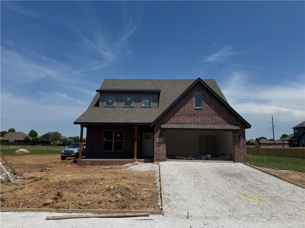 Our newest plan!  This south facing 4- bedroom (2 up and 2 down), 3 full bath home, with a bonus room features 3 cm quartz counters, upgraded tile, a designer brick fireplace, 4 disk lights in all of the bedrooms, a dresser in the primary bedroom closet, a barn door in the primary bedroom, and a craftsman feel. Other amenities include custom cabinets with soft close hinges, stainless steel appliances with a designer gas range vented to the exterior, low-e windows, designer lighting, luxury vinyl plank flooring, low-e windows, 2" faux wood blinds, full privacy fence, full gutters with downspouts, irrigation system in the front and back w/ an exterior control, lots of trees and more! The community is located in the Bentonville School district and is just minutes from fine dining, entertainment, and the Bentonville Community Center. Preferred lenders are paying up to $5,000 toward closing costs, prepaids, or discount points!
