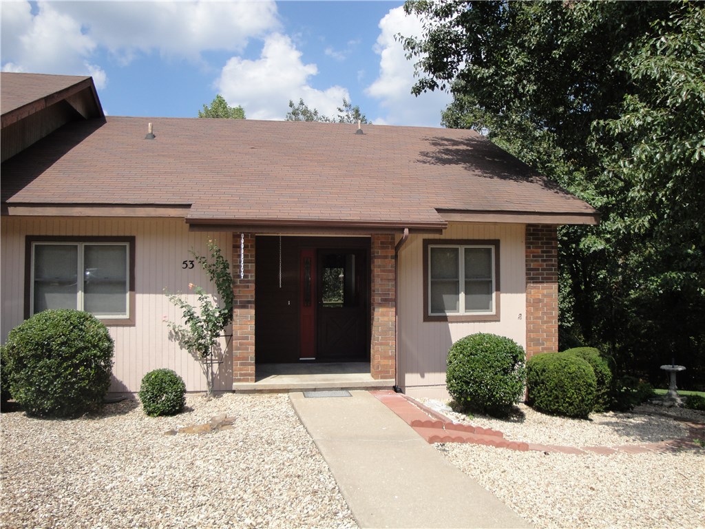 Lovingly maintained, spotless, 1 level, 2 bed-2 bath non-smoking, end unit townhome. Never a rental! Walk to nearby Metfield golf course/club house/workout center! New HVAC in 2016, hardwood floors, new carpet, open floor plan. Plenty of storage. Washer, dryer & nice refrigerator convey.  Owners have added lots of nice landscaping and steps off deck to access level back yard. Green space in back and side offer private, wooded views.  Maintenance free yard- POA provides lawn care! Very nice home..