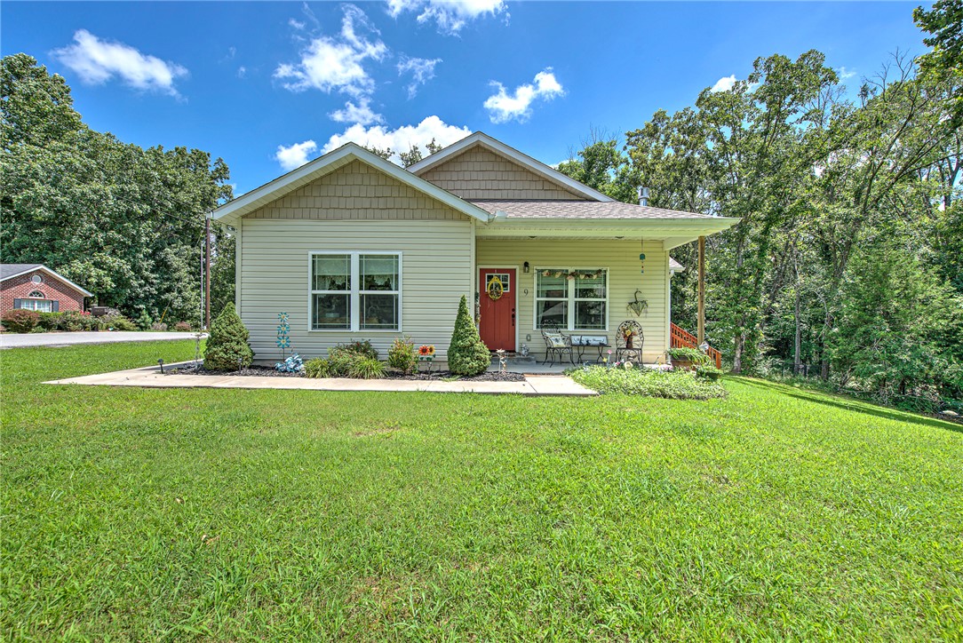 Welcome to your Bella Vista home! Nestled on a generous, .34-acre lot, this charming 2-bedroom, 2-bathroom home offers the perfect blend of comfort, functionality, and the serene natural beauty Northwest Arkansas is known for. Step inside to find an inviting, light-filled floor plan that effortlessly accommodates daily living . A highlight of this home is the versatile bonus/craft room—a dedicated space perfect for a home office, hobby studio, or quiet reading nook. Both bedrooms are well-proportioned, offering peaceful sanctuaries at the end of the day. Outside, the expansive yard provides a private oasis with plenty of room for gardening, outdoor dining, or simply watching the local wildlife. Situated at 9 Kincardine Dr., you are just moments away from Bella Vista’s world-class amenities, (Branchwood Rec center 1.2 miles) including pristine golf courses (Highlands Golf course and Pub 2.75 miles) , serene lakes (Lake Loch Lomond Marina 4.25 Miles, and the renowned Back 40 and Little Sugar trail systems.