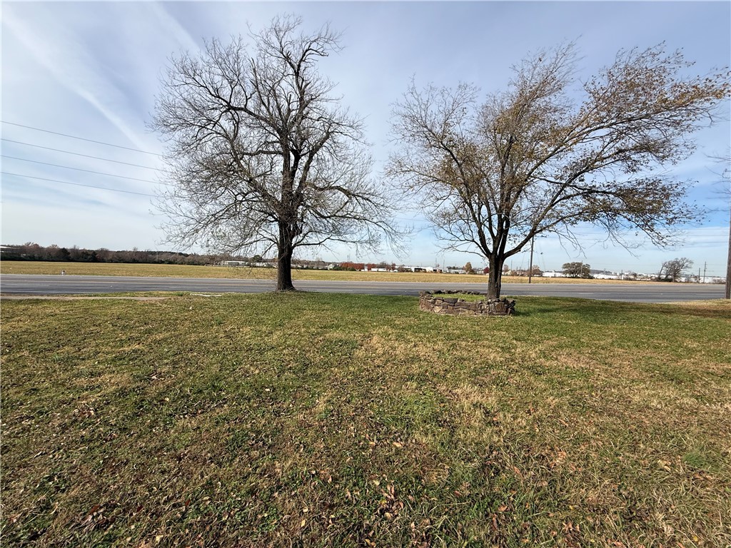 Prime .83 acre m/l industrial lot in the heart of Springdale’s growing industrial district. This flat, usable parcel offers excellent access to major corridors, including Hwy 412 and I-49, making it ideal for warehousing, light manufacturing, distribution, or contractor facilities. Utilities are available, and the site provides ample space for building, parking, and yard storage. Hard-to-find industrial land in a high-demand corridor—ready for your next project or investment.