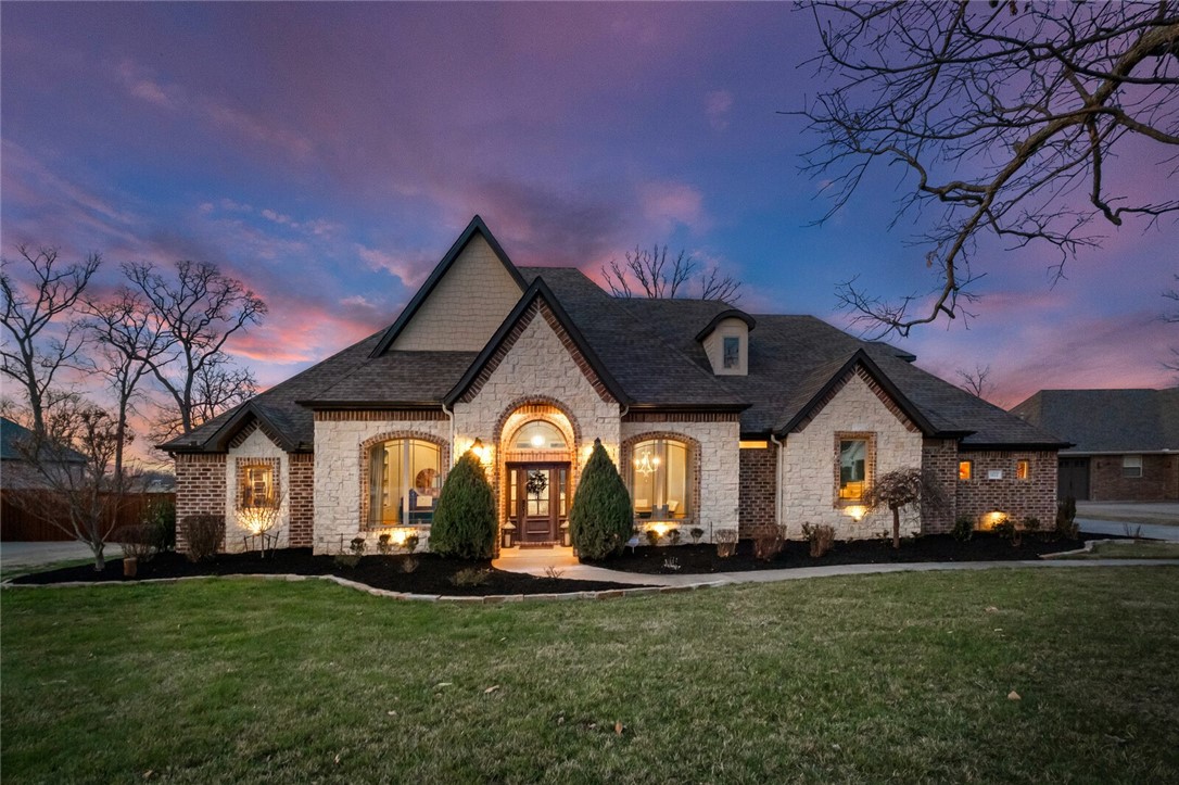 Come home to this unique luxury 5 BR, 5 bath home in highly desired Ridgewood SD. This home has a peaceful and relaxed feel and is located just 7 minutes from Pinnacle Hills and the entertainment district. 
Sitting on .93 acres, this custom home is professionally landscaped with mature trees that add a layer of privacy and plenty of room to add a pool. Gourmet kitchen features two-islands, 6-burner gas stove and a double oven.  Wood burning fireplace in living room puts out enough heat for entire home. 
The main bedroom features two his/her closets, complete with built-in shelving. Additionally, there's a concealed space ideal for extra storage or use as a safe room. Geothermal heating & cooling, wired-in generator, all surround system, well water irrigation and a 6-person in-ground storm shelter.  Large attic area over the garage can be finished out for additional bonus or craft room.