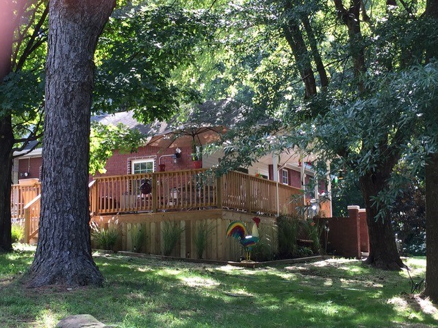Location, almost an acre, and no surrounding neighbors are just a few of the fantastic features of this home.  Located approximately 1 ½ miles west of Wagon Wheel exit off I-49. Newer flooring, new roof. Detached 20x32 storage bldg/workshop, wired 220, wood stove & attic storage. Private master bdr. Spacious yard with perfect garden spots. Comfortable deck front and side of home make great bird/wildlife watching or entertaining.  Buyers allowance with acceptable offer to complete painting and trim work.