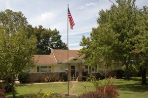 This Bull Shoals Lake hideaway will not disappoint! 2 or 3bed 2bath home boasting cathedral ceilings, floor to ceiling stone fireplace with new insert, wide open floorplan, new high efficiency HVAC, wonderful covered back deck to enjoy the wildlife, winter lake view from back deck, Summer lake view from front yard, walk-out basement and property borders Corps line! Must see to appreciate!!