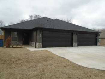Ideally located in the heart of Gentry just South of Main Street. Just minutes from the park, library, and Gentry schools. Walking distance to McKee Plant. Open floor plan concept from kitchen to living room, walk in closets, central heat & air, granite counter tops, and a custom interior design! NO CARPET.