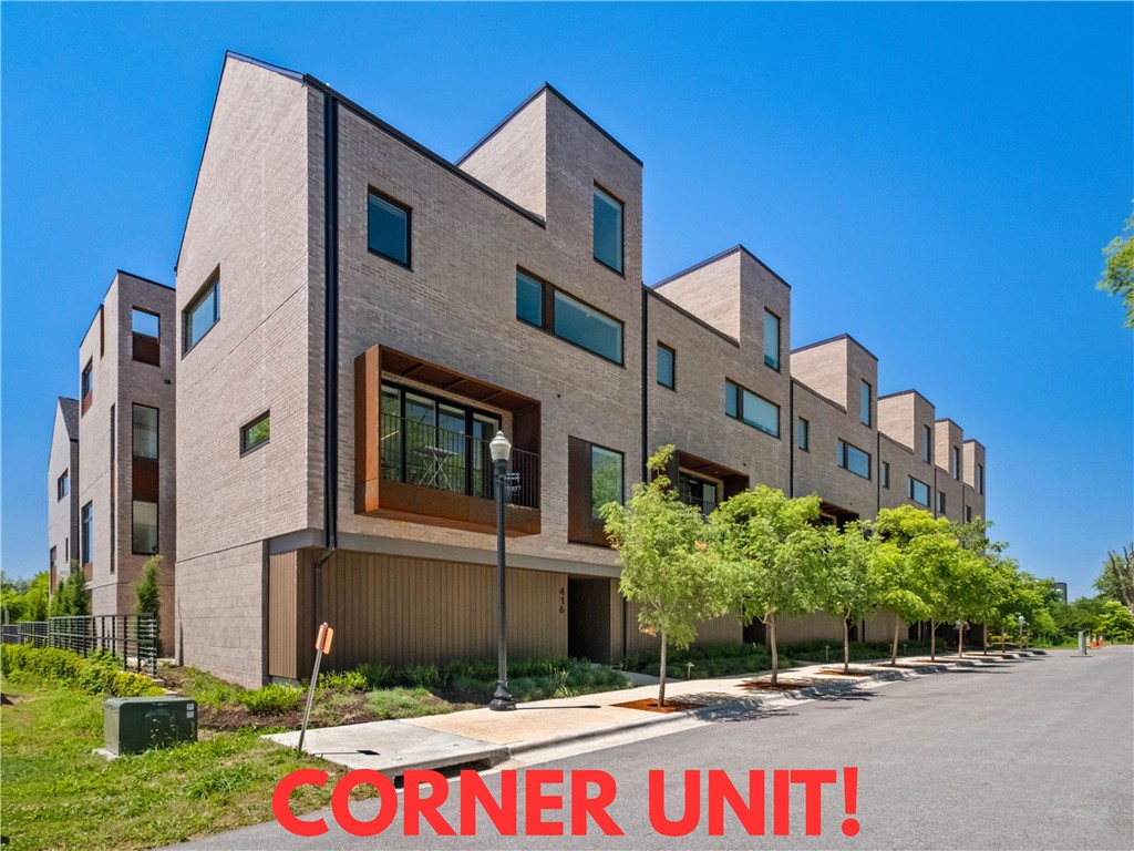 Check out this well maintained corner unit condo in the heart of downtown Bentonville! This is the community's most desirable unit. Only a 3 minute walk to The Momentary, 8th St Market, and the Razorback Greenway! You'll also enjoy the close proximity to the new Walmart Campus and Downtown Square. This modern home features a 2-car attached garage and stunning finishes throughout. Inside, the unit is equipped with custom blinds and smart technology. With 2 bedrooms and 2.5 baths, plus an upstairs loft, there’s plenty of space for living and entertaining. Enjoy hardwood floors, stunning quartz counters, and custom-built walnut cabinets. Abundant natural light fills the space, creating a warm and inviting atmosphere. Relax on your private covered balcony. 2 hot water heaters. Washer, dryer, and refrigerator convey. Short term rentals are allowed. Qualifies for secondary market financing (30-year fixed rate)