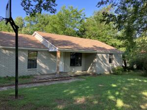 Property investors - take a look at this one.  So close to a complete remodel of this 1,119 sqft 2 BR, 2 BA home sitting on 2 acres that's less than 5 min drive from Russellville city limits and great fishing & boating on Lake Dardanelle.  All new since 2018:  HVAC, roof, wiring, most plumbing, water heater, doors, ceiling fans, luxury vinyl plank flooring, ceramic tile bathroom floors/tub & shower walls, kitchen counters/cabinets, oven/range, dishwasher, & range vent.  Vaulted ceiling & bay window in living room.  Plus, mostly fenced backyard and a detached 2-car carport with a 12ft x 20ft enclosed shop room on the side.  Being sold ''as is''.  Pick this one up and carry it the last few yards and reap the rental income.  Seller will consider all cash offers.