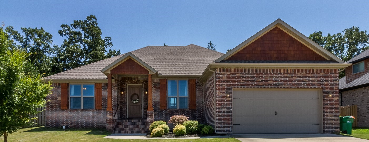 Beautiful 4 bed/3 bath home located in Tamarron Estates in Centerton. Perfectly zoned for outstanding schools. This is a well kept home that features a split floor plan, cathedral ceilings, thick crown molding, custom cabinets, and high-quality finishes throughout. Living room features hardwood floors and exposed wooden beams! Spacious kitchen amenities include granite countertops, tons of storage, and a large island. All bedrooms are carpeted with walk-in closets. Master suit features a whirlpool tub, walk-in shower and double sink. Outside there’s a covered patio and large backyard with a gorgeous wooded view- perfect for privacy. Shed, chicken pen, and garden boxes convey at no cost. Come see your next home!