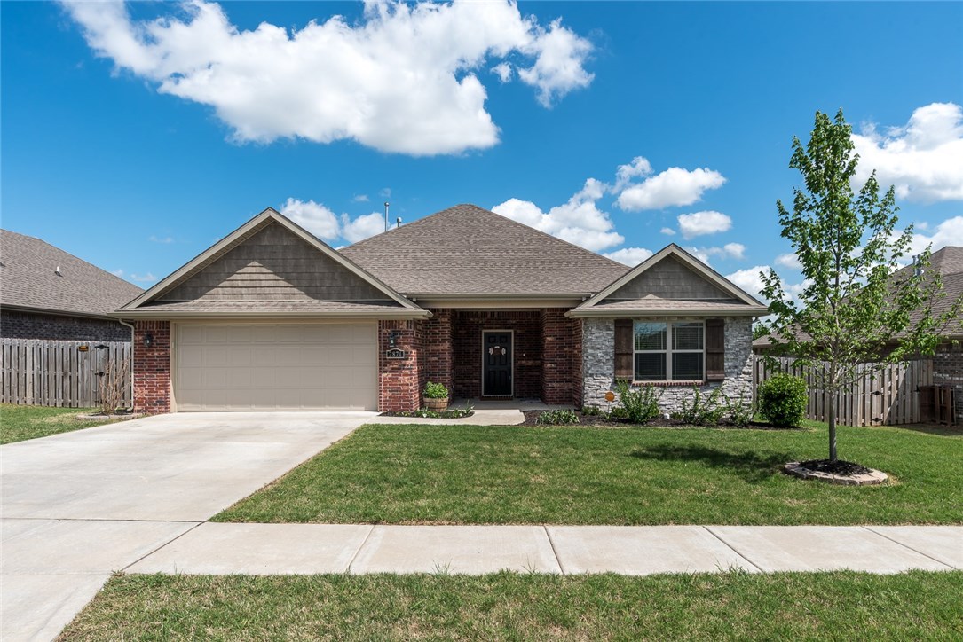 Spacious home on the Westside of Fayetteville. Easy access to I-49. This open floor plan home has a large living room, kitchen, master and backyard. Sit outside under the covered patio and see the mountains to the south. Close to walking trails. This Riverwood home won't last long.
