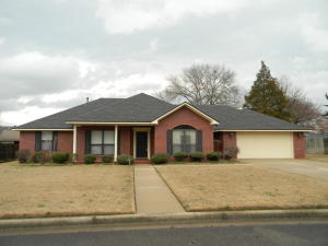 GREAT LOCATION .. Brookview Estates, near schools, shopping & medical facilities. This 4 BR home has many great features. From the large open greatroom with fireplace, to the covered patio. The laundry room includes a sink, a utility closet and nice cabinets for storage.  The home has 2 full baths, both with double vanities. The master BR is large, and the master bath has a jetted tub, shower and double walk in closets. The yard is easy to water with the sprinkler system. The home is handicapped accessible.