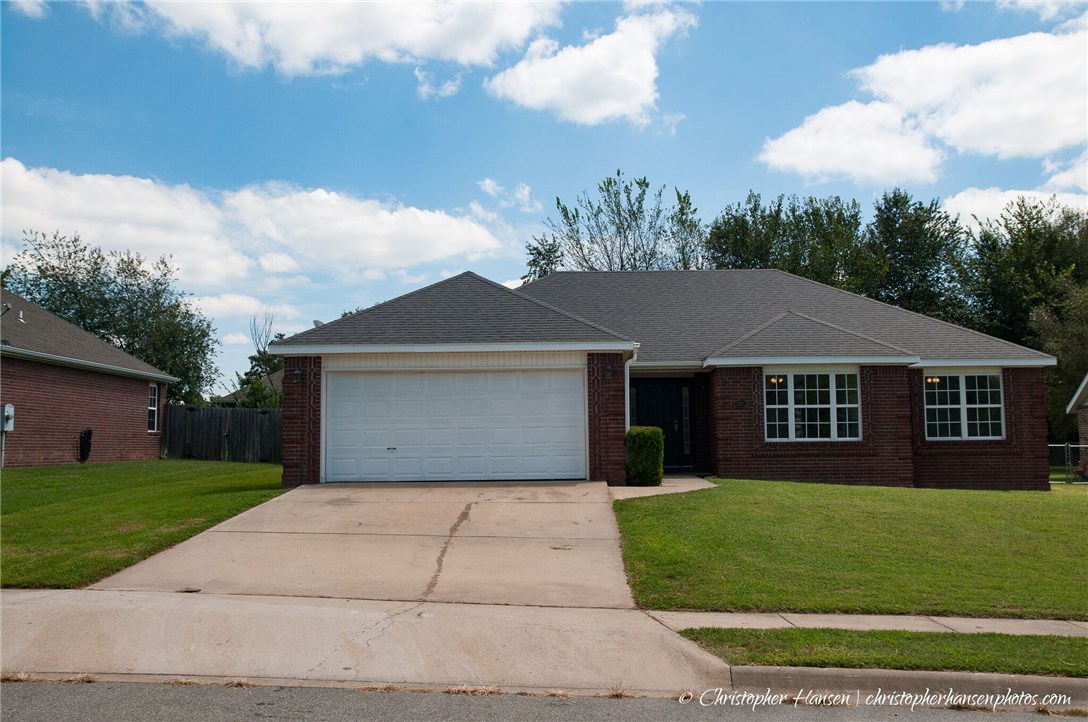 This home has it all.  3 bedrooms, 2 full baths, gas fireplace, large fenced back yard.  Fresh paint, air conditioner is 1 year old, new range and Home Warranty.  Walking distance to school.  Great neighborhood in a charming small town.  Master has walk-in closet and whirlpool tub.  Cutest home for the price in Prairie Grove!
