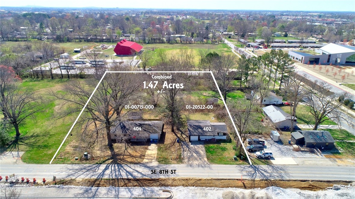 Prime location, Development opportunity! Downtown Core zoning. Two parcels on SE 8th St, totaling 1.47 acres. Both lots face SE 8th St close to the downtown square, art museum, and new corporate campus. 8th Street improvements are underway. Each parcel has a house on it, neither has any value. Property is also listed at land mls#1270363