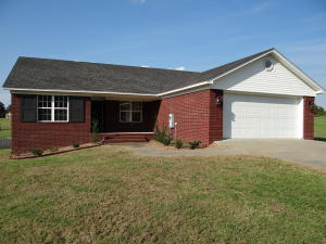 Large living area with new hardwood floors overlooking 1 acre lot. Kitchen features updates such as quartz tops and updated appliances. Large master suite w/ separate walk in shower and tub and his/hers closets.  Optional 4th room for office or hobby room available in garage as well that's heated and cooled.