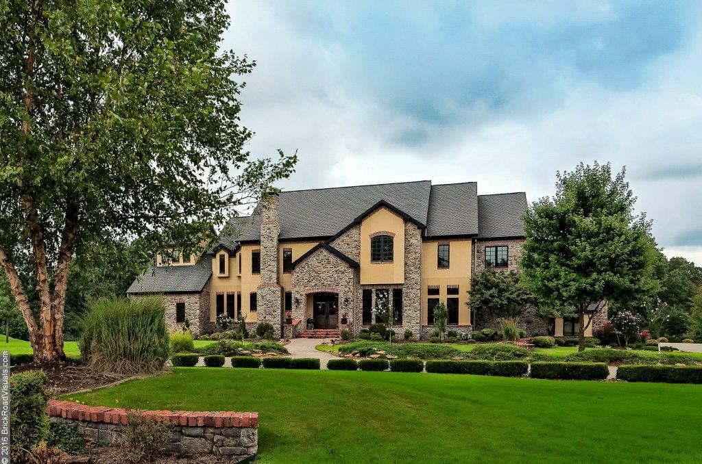 Private resort style backyard with multi-level decks, swimming pool, 2 outdoor kitchens, fire pit, fireplace, and guest house.  Beautiful curb appeal, state of the art kitchen, and open floorplan great for entertainment.  Custom designed wine cellar.  Organizers dream home with lots of built ins and custom closet features.  Quality finishes and craftsmanship thoughout.  Just minutes form new Bentonville West HS and WM HO.