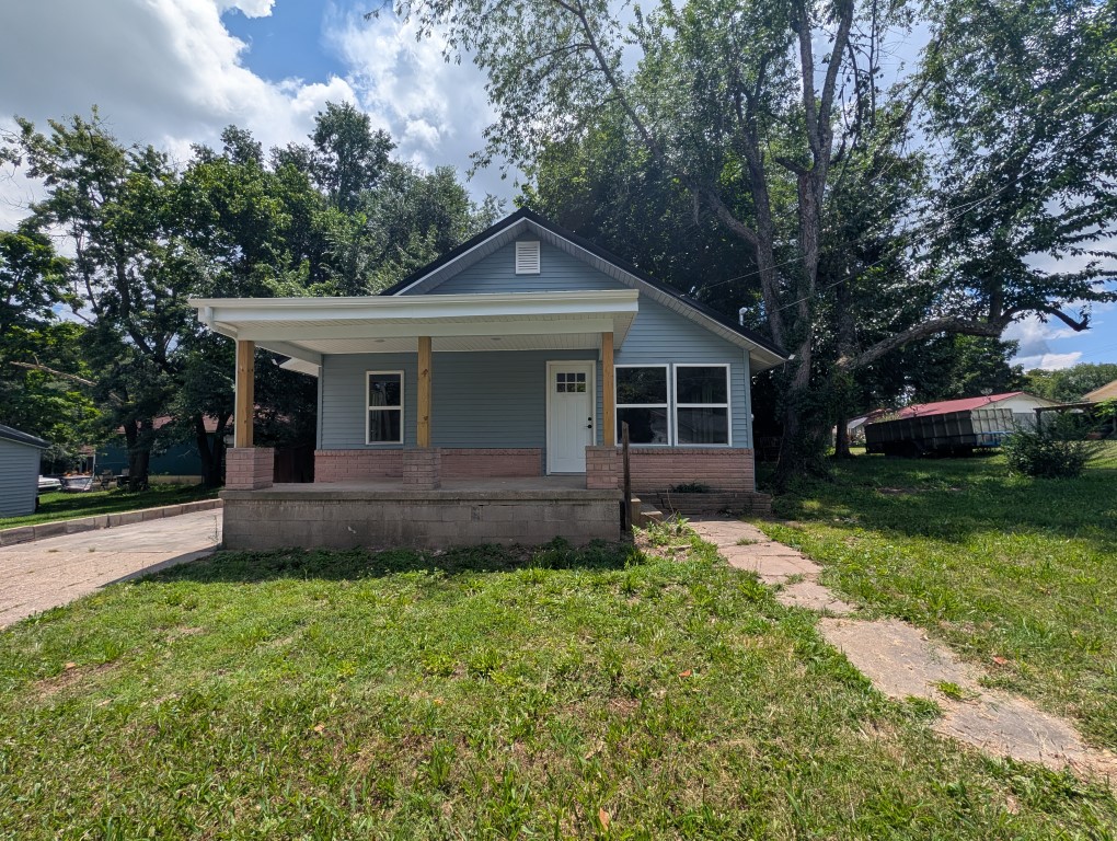 Completely remodeled from top to bottom, this adorable 2-bedroom, 1-bath home is move-in ready! Featuring central heat and air, low-maintenance vinyl siding, and a durable metal roof, this home offers both comfort and peace of mind. Inside, you'll find a beautifully updated interior with new plumbing, new wiring, new windows, new kitchen and quality finishes throughout. Whether you're a first-time homebuyer, looking to downsize, or searching for a great investment property, this charming home is one you won't want to miss!  All #s are approx, age & square footage are estimates.