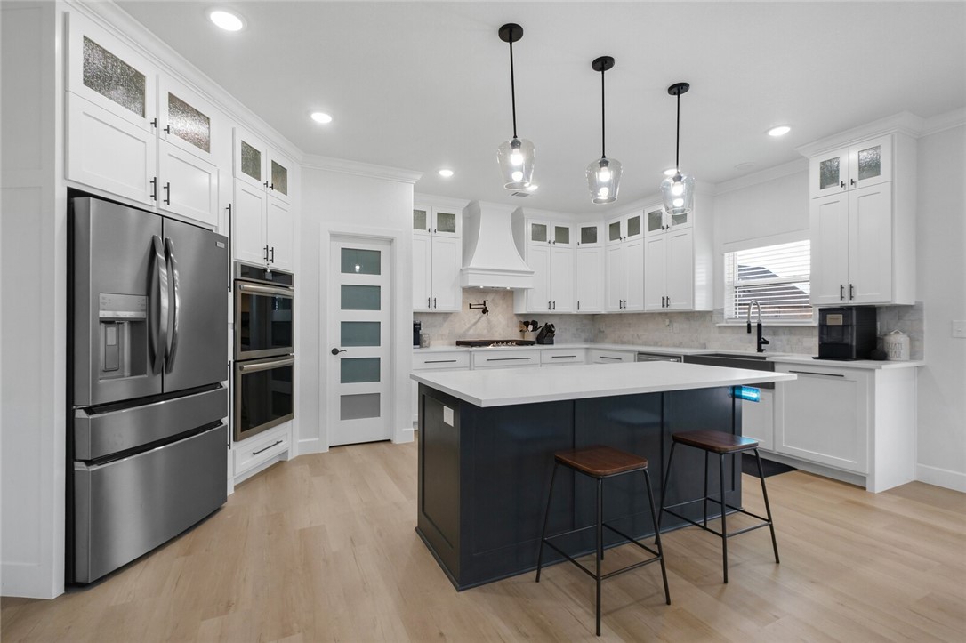 $4,000 IN PREFERRED LENDER CREDIT! Over 3,100 sq ft of like-new living just 10 minutes from the new Walmart Home Office-this 2024-built home offers space, style & convenience in one of Pea Ridge's most desirable communities. Situated on a prime corner lot in Elkhorn Ridge, this thoughtfully designed home features an open-concept layout filled with natural light, LVP flooring throughout, & custom cabinetry w/ exceptional storage. A convenient laundry chute & upgraded exterior lighting add both function and style. The spacious primary suite offers a designer closet & spa-like ensuite, while a second upstairs ensuite, two additional bedrooms, & a large bonus room provide flexible space for guests, work, or entertaining. Enjoy outdoor living on the covered back porch w/ a shadowbox privacy fence & full sprinkler system. A three-car garage adds even more convenience. All just minutes from Bentonville-this home delivers exceptional value without the wait of new construction.