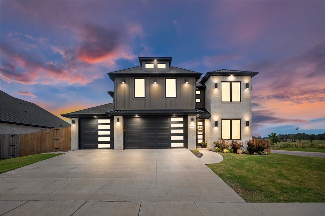 $4,000 IN PREFERRED LENDER CREDIT! Over 3,100 sq ft of like-new living just 10 minutes from the new Walmart Home Office-this 2024-built home offers space, style & convenience in one of Pea Ridge's most desirable communities. Situated on a prime corner lot in Elkhorn Ridge, this thoughtfully designed home features an open-concept layout filled with natural light, LVP flooring throughout, & custom cabinetry w/ exceptional storage. A convenient laundry chute & upgraded exterior lighting add both function and style. The spacious primary suite offers a designer closet & spa-like ensuite, while a second upstairs ensuite, two additional bedrooms, & a large bonus room provide flexible space for guests, work, or entertaining. Enjoy outdoor living on the covered back porch w/ a shadowbox privacy fence & full sprinkler system. A three-car garage adds even more convenience. All just minutes from Bentonville-this home delivers exceptional value without the wait of new construction.