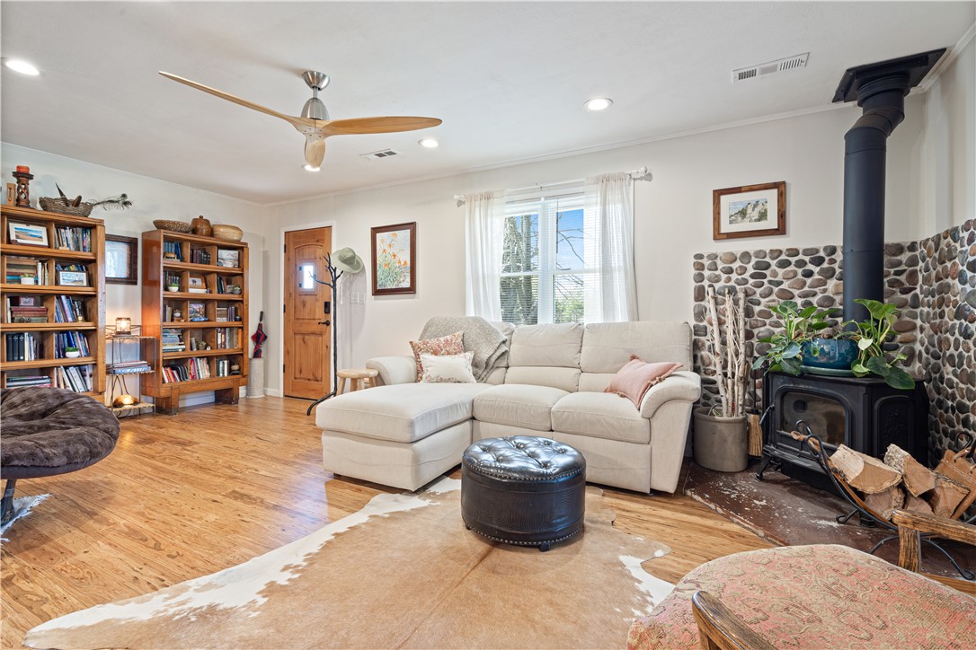 Escape to your private retreat on 9.37 acres m/l, just 20 minutes from Fayetteville or Huntsville. This restored 1951 home, remodeled in 2017, offers 1,152 sq ft of comfortable living. The open concept main room boasts bamboo flooring and a Harmon wood stove with glass front.  Three spacious bedrooms and one with one quarter bath all tastefully appointed. Recent water heater and softener, plus a mudroom with shower for easy cleanup. 

The property includes multiple quality outbuildings, featuring a fully insulated 30x40 shop, provision building with electricity, and additional garage/storage space. Enjoy a pond, garden area, fire pit, and a modernized outhouse near outdoor spaces.

A 75-ft well with Bison pump and dedicated outdoor watering provide reliable water access. RV pad with 50-amp hookup adds convenience for guests. A peaceful, functional property designed for comfort and country living.