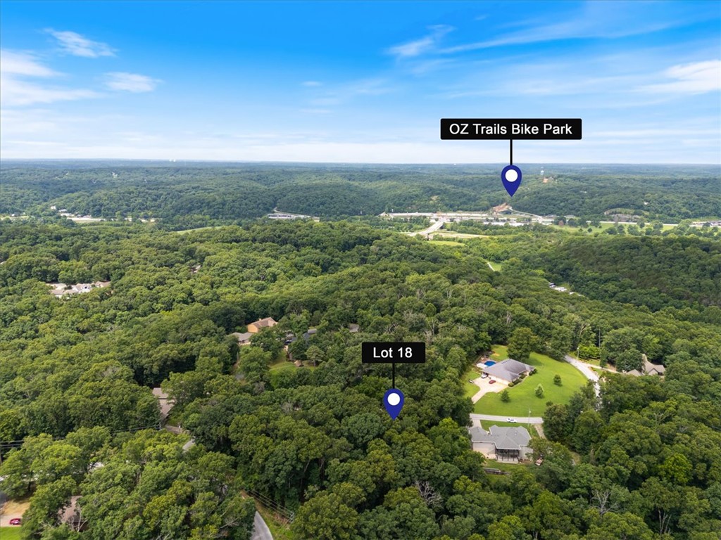 *Rare* oversized 0.64-acre lot with an impressive 190’ of frontage in the heart of Bella Vista! Build your dream home just minutes from Blowing Springs Park, the Back 40 and Little Sugar trail systems, golf courses, lakes, and all the outdoor recreation that makes Northwest Arkansas a premier destination. Enjoy the peace of Bella Vista while being just a short drive from downtown Bentonville, Crystal Bridges Museum of American Art, the Walmart Home Office, and the vibrant dining, shopping, and entertainment scene. Come take a look and see what makes this lot so special- the size, the established street, the location...