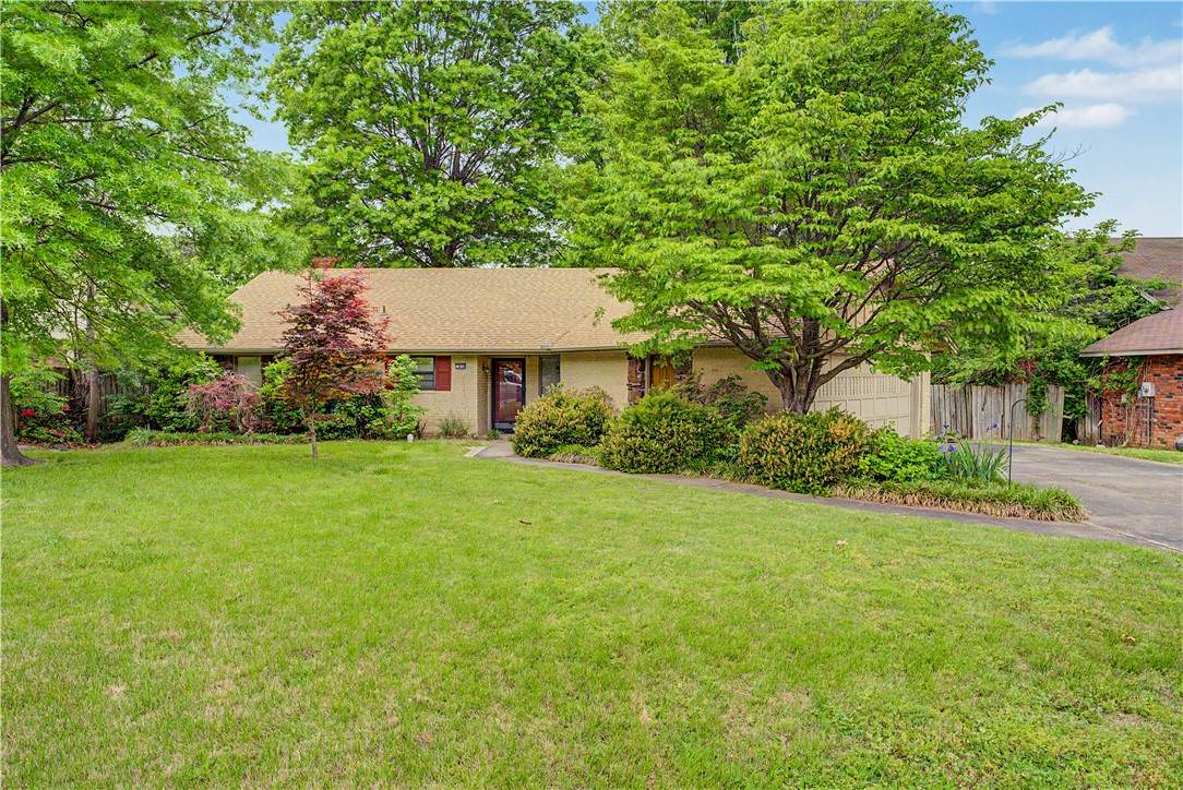 Discover a promising opportunity and a chance to make this house yours in the heart of Springdale. The property includes three bedrooms and two full baths. Large living room area with a cozy wood-burning fireplace. Although the deck will need to be replaced, this is the perfect time to revamp the backyard exactly how you want it! With some TLC, this home is ready for its next chapter; schedule a showing today to explore its potential. Sold AS-IS.