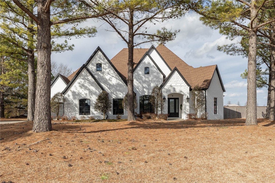 This newly renovated single family home is located in a highly desired neighborhood in Fayetteville, AR. This home has beautiful mature pine trees that fill the front yard, as well as spacious landscaped backyard. Upon entrance, you are greeted by high ceilings, wood floors, fresh paint, & large windows that create a bright and inviting space. This open floor plan seamlessly connects to the kitchen, living room & into the backyard that is perfect for entertaining. Attention to detail is present in the kitchen with quartz countertops, double oven, gas stove, a pot filler, and a large pantry. The oversized primary bedroom is filled with natural light, marble attache floors and decorative ceiling. The large primary bathroom contains a steam shower, stand-alone tub, beautiful stained glass window and walk-in closet. On the opposite side of the house you will find three additional bedrooms all with on-suite bathrooms. This home also has an office with custom built-ins, bonus room with a fireplace & formal dining room.