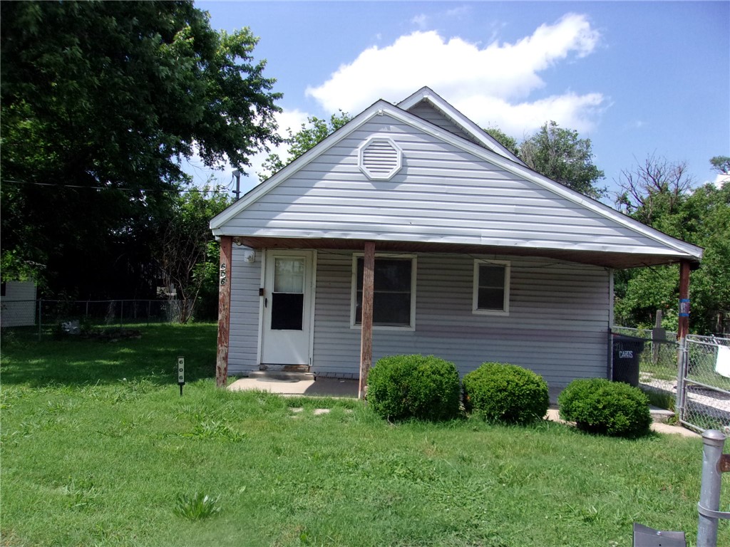 Newly remodeled home with new flooring in living room and kitchen and dining area. New kitchen cabinets and sink and new butcher block style counter tops. Bathroom has new walk-in shower. These 3 bedrooms has potential for 4th bedroom, with carpet. Also has washer/dryer hookups. Great first-time home buyer or investment property. Close to schools and walking trails. Yard is chain linked fenced in with 8x16 storage building in back yard. Call for more information