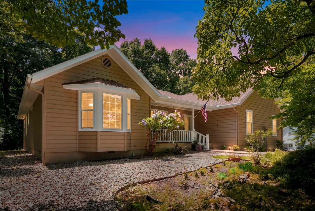 Whether you’re looking for a great family home or an investment property, this home offers it all, now priced to sell! Situated on a 0.35-acre lot with the privacy and feel of acreage thanks to the Back 40 behind the home, this 2,000+ sq. ft. home features 2 bedrooms plus an oversized flex room ideal as an office, guest room, or additional sleeping space. The open layout is perfect for entertaining. Relax on the screened porch overlooking the woods with morning coffee or unwind after a day on the trails. Tucked away on a quiet cul-de-sac, enjoy a rare combination of privacy, a spacious driveway, and ample parking for guests, trailers, bikes, or outdoor gear. With direct access to the renowned Back 40 Trail System, world-class biking and hiking are right outside your door. Detached shed for a workshop, bike parking or storage. Updates include HVAC, roof, flooring, and paint. Located in the Bentonville School District, this home offers value, location and the Bella Vista lifestyle you've been looking for!