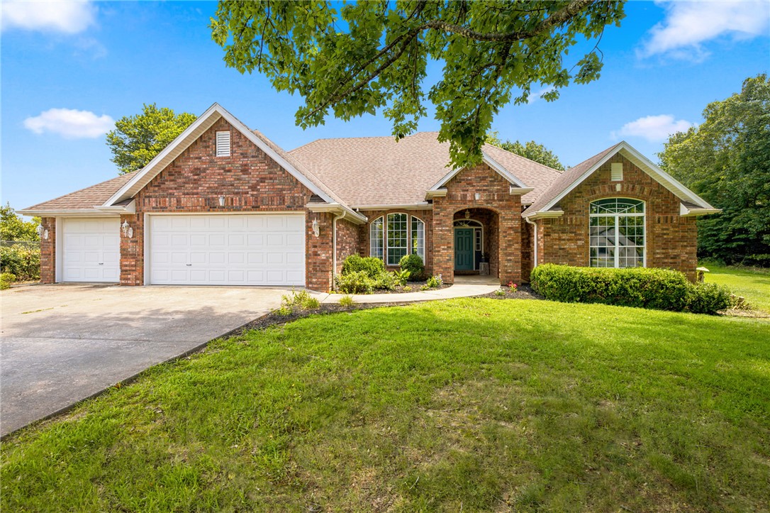 Discover the perfect blend of space, privacy, and convenience in sought-after Forest Hills! Situated on a beautiful 1.43-acre estate lot surrounded by mature trees, this recently updated 3,020 sq ft home offers 5 bedrooms, 3.5 baths, and a functional layout designed for everyday living and entertaining. The spacious living area flows into the kitchen and dining spaces, while the oversized primary suite provides a relaxing retreat. Multiple bedrooms offer flexibility for guests, a home office, or hobbies. Outside, enjoy the peaceful setting, expansive yard, and room to play, garden, or simply unwind. A 3-car garage provides plenty of storage and workspace. Located on a quiet street in one of Fayetteville's most desirable neighborhoods, you'll enjoy the charm of established homes, large lots, and a serene setting just minutes from shopping, dining, and the University of Arkansas. A rare opportunity to own an updated home with acreage in the heart of Fayetteville! Farmington Schools