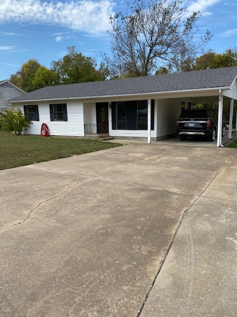 Welcome to this solid 3-bedroom, 2-bathroom home with real potential! This single-level, 1,072 sq ft home sits on a generous 0.26-acre level lot within the highly regarded Gravette School District. Currently tenant occupied, it's a fantastic investment opportunity with immediate income potential. Inside, you'll love the glass cooktop, electric range, and microwave vent, making the kitchen both functional and stylish. Ceiling fans and a washer/dryer connection add everyday convenience. Step outside to a beautifully fenced backyard shaded by mature trees — perfect for relaxing on the patio or letting the kids and pets roam freely. A 120 sq ft storage building adds bonus utility. The attached carport and concrete driveway round out the practicality. With central gas heat, central electric A/C, an architectural shingle roof, and low annual taxes of just $1,096, this home checks all the right boxes — whether you're an investor or a savvy first-time buyer. Schedule your showing today!