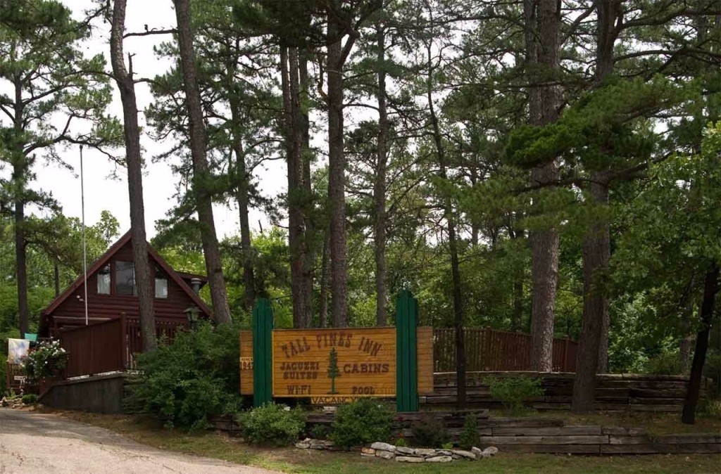 "Tall Pines Inn"  Beautiful wooded setting just minutes from downtown Eureka Springs.  Log Cabins, Jacuzzi Suites and Family Friendly cabins make up this fantastic lodging.  Each unit is heated and cooled, several have fireplaces, porches and decks.  There is a lovely heated pool, picnic area, trails, wifi, cable and even a trolley stop just outside your door.  The current owners have taken great care of this property.  Well established and ready for you to be the next owner.