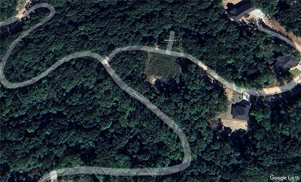 This 0.28-acre residential lot is located in the established Exminster Subdivision of Bella Vista, Arkansas, within the Bentonville (Bella Vista City) school district. Nestled along Exminster Circle, the property offers a wooded setting and neighborhood feel while still benefiting from Bella Vista’s growing amenities and Northwest Arkansas’ dynamic employment and retail centers. With its platted Lot 5, Block 4 configuration in EXMINSTER SUB-BVV and taxable status, this parcel is well suited for a future homesite or long-term land hold in one of Benton County’s most desirable communities.