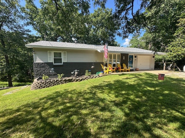 Remodeled move-in ready absolute gem in highly desirable Pines Subdivision on E Mountain Dr between E Van Buren (Hwy 62) near Historic Downtown Eureka Springs, near Crescent Overlook. All Luxury Vinyl Plank Wood-Finish flooring, remodeled kitchen, all new appliances, new interior doors & hardware, updated bathrooms,  new paint, new ceiling fans & more. Features 4 Bedrooms (or 3+ Flex), 2 Full Bathrooms, modern Kitchen with granite counter tops, large deck with stunning nature views, central AC & Heat, functional finished basement with Family Room/Game Room & Wet Bar, attached Garage & Utility Room AND a large workshop with separate entrance. All this plus two driveway/parking areas and a separate rear access which could turn the lower level into a private suite.
Zoned R2 Contemporary Residential. Nightly rentals not allowed. Long term rentals OK.
AGENT OWNED. Main Level 1,188 sq ft + Finished Basement 812 sq ft = 2,000 total sq ft fully finished with HVAC.