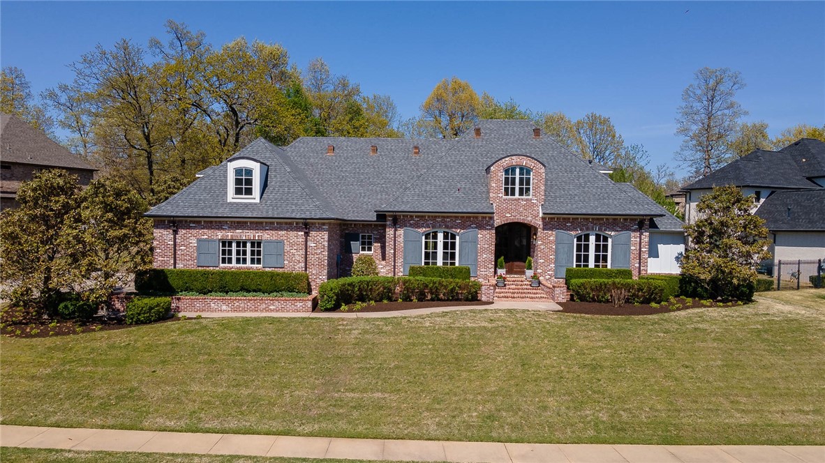 Welcome home to the prestigious gated community of Clear Creek! This luxurious home boasts an open floor plan, hardwood floors, built-ins throughout, &  formal office with a coffered ceiling for added elegance. The living room opens to the kitchen & has a stone-cast fireplace, creating an inviting space for entertainment. The kitchen is the heart of any home; this one is no exception. Features include stainless appliances, double ovens, a beautiful marble island, Butler's pantry, & a breakfast area. The primary suite is a sanctuary with a vaulted ceiling, providing you with a peaceful escape. The primary bathroom features a STUNNING spa-like soaking tub, walk-in shower, & walk-in closet. The main level includes a guest suite & a half bath. Upstairs you'll find three bedrooms & two baths, providing plenty of accommodation. The bonus room is a versatile space that can be used as a game room or sitting area. The large yard is ideal for outdoor activities & has room for a pool. Come see YOUR perfect place to call home!