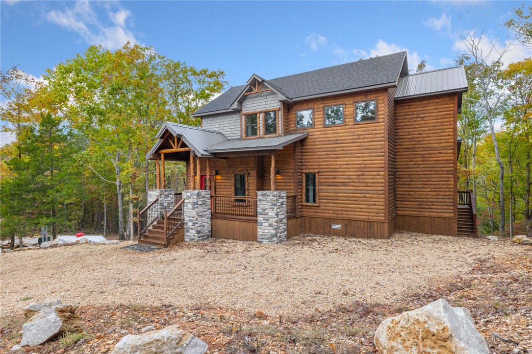 Discover refined country living in this custom-built 3 BR 3.5 BA home with two master suites and two living areas 1,788 sq ft home on 4.78 acres, perfectly located just minutes from Jasper, Arkansas. Designed with craftsmanship and attention to detail, this beautiful property combines privacy, comfort and stunning scenery. Step inside to an inviting open floor plan with quality finishes throughout, then step outside to the spacious back deck and take in the stunning, unobstructed views of the Ozarks a perfect space for morning coffee, evening sunsets, or entertaining guests. A true blend of comfort and adventure, this home is located near some of the best outdoor recreation in the region, including the Buffalo National River, Ozark National Forest, scenic overlooks, waterfalls, and endless opportunities.
Whether you’re searching for a permanent home, a second home in the mountains, or an income-producing STR property, this one delivers the lifestyle, the setting, and the upgrades to make it exceptional.