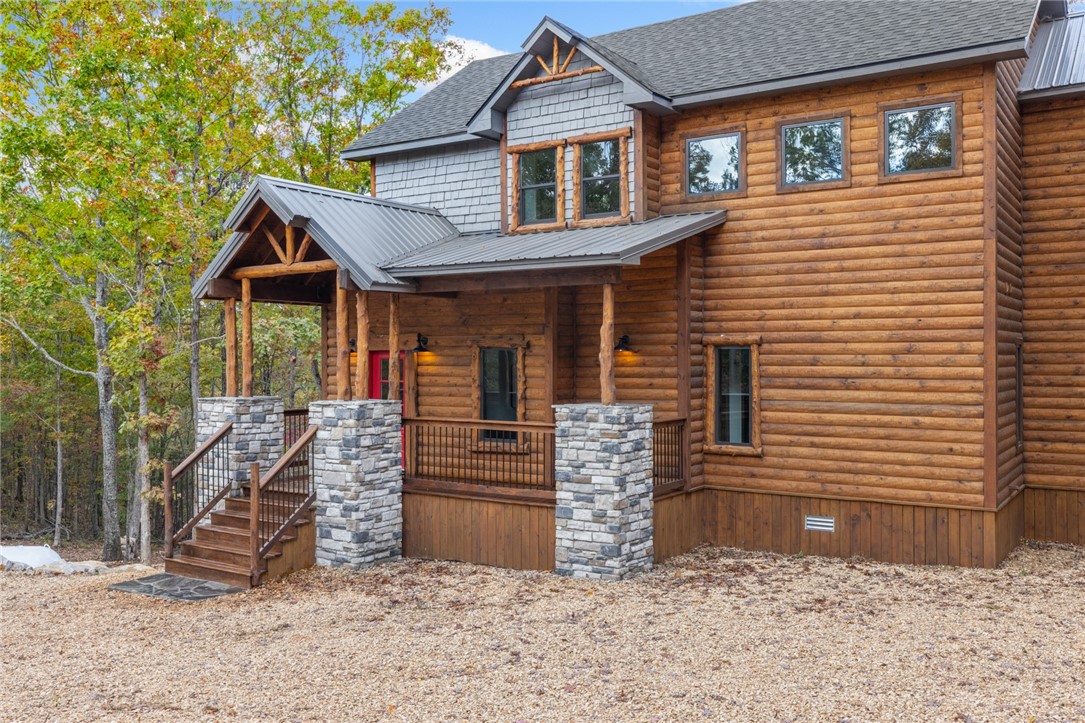 Discover refined country living in this custom-built 3 BR 3.5 BA home with two master suites and two living areas 1,788 sq ft home on 4.78 acres, perfectly located just minutes from Jasper, Arkansas. Designed with craftsmanship and attention to detail, this beautiful property combines privacy, comfort and stunning scenery. Step inside to an inviting open floor plan with quality finishes throughout, then step outside to the spacious back deck and take in the stunning, unobstructed views of the Ozarks a perfect space for morning coffee, evening sunsets, or entertaining guests. A true blend of comfort and adventure, this home is located near some of the best outdoor recreation in the region, including the Buffalo National River, Ozark National Forest, scenic overlooks, waterfalls, and endless opportunities.
Whether you’re searching for a permanent home, a second home in the mountains, or an income-producing STR property, this one delivers the lifestyle, the setting, and the upgrades to make it exceptional.