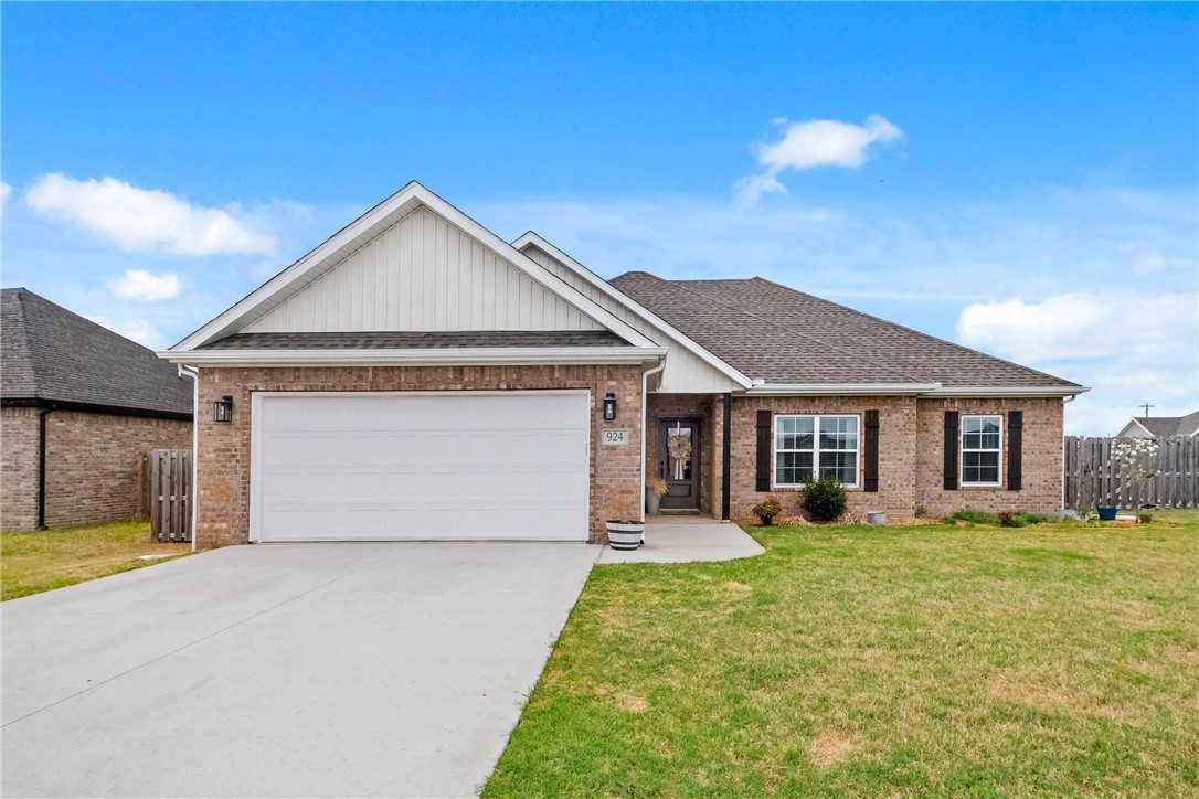 Welcome to 924 Laux Lane—a beautifully maintained 4-bedroom, 2-bath home in the desirable Hazelton Heights neighborhood in Pea Ridge. Built in 2021, this home offers a bright, open-concept layout with a spacious living area, modern finishes, and a kitchen designed for both everyday living and entertaining.

The split floor plan provides a private primary suite, while the additional bedrooms offer flexibility for guests, a home office, or growing needs. Natural light throughout the home and clean, well-kept interiors make it truly move-in ready.

Situated on a large corner lot, the backyard offers plenty of space to relax, play, or host gatherings. Located directly behind Pea Ridge High School and just minutes from local shopping and dining, you’ll enjoy small-town living with quick access to Bentonville.