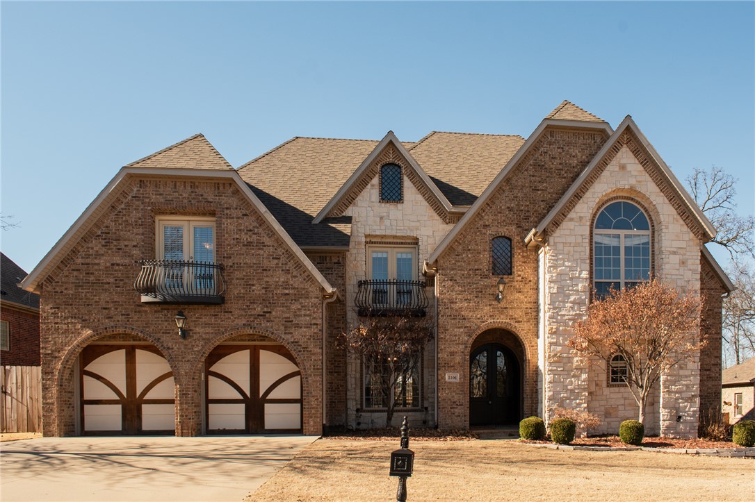 Welcome to this beautiful home in Pinnacle Gardens! Entering through the front doors you are greeted with a vast open living room with high ceilings this generous space is a theme throughout the home, with four spacious bedrooms, three full baths, two half baths, and a media room, this residence provides ample room for comfortable living. The primary suite is just as extravagant with large windows arched along the exterior wall and a two sided fireplace leads you into the large bathroom and closet. Opposite the primary suite is the kitchen and second dining space, flanked by large windows and access to the back deck and covered patio perfect for entertaining guests in both spaces. On the second floor 3 bedrooms and 2 bathrooms are spread along an open walkway with a large media room with a wet bar at the end. This is a rare rental location in a meticulously maintained subdivision. Lawn care can be included in this lease.