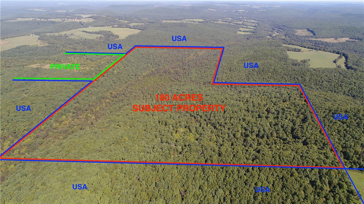 Approximately 2.25 of 2.5 miles of boundary line is bordering National Forest. Older cabin on property. There are 2 wells and 2 spring fed ponds on the property. One of the King River tributaries runs through the property and the owner has never seen it dry providing a year round water source along with the spring fed ponds to hold the wildlife.  The trails throughout the property were just manicured with a dozer. Mature timber on the property. The property has not been hunted in 3 years.