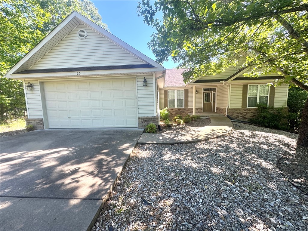 3 bedrooms/2 full baths-Split floor plan. Open living/kitchen/dining. Neutral colors through out.  All appliances convey, including washer/dryer. Large utility room. Exposed deck with private wooded view. 2 car garage. Gravette School district. No animals. Nonsmoking environment. Tenant responsible for lawn care.