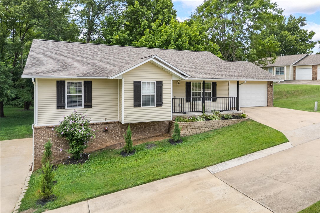 Discover the perfect blend of comfort, convenience, and versatility in this beautifully updated 4-bedroom, 3-bath home. Thoughtfully designed for modern living, this property is move-in ready. Ideal for multi-generational living, the home boasts a spacious  handicap accessible walk-out basement complete with its own garage making it perfect for an extended family, guests, or added privacy. The workshop area in the basement garage provides the perfect space for hobbies, storage, or projects. Step outside and enjoy access with a private gated entry to scenic walking and biking trails, as well as a dog park making it perfect for staying active and enjoying the outdoors. No more hassle and upkeep with mowing. This home includes. maintenance, of your lawn, giving you more time to relax and enjoy your home. With its flexible layout, and desirable amenities, this home offers something for everyone whether you're entertaining, working, or simply enjoying everyday​​‌​​​​‌​‌​​​‌‌​​​‌‌‌​​‌​​‌‌​​​​ living.