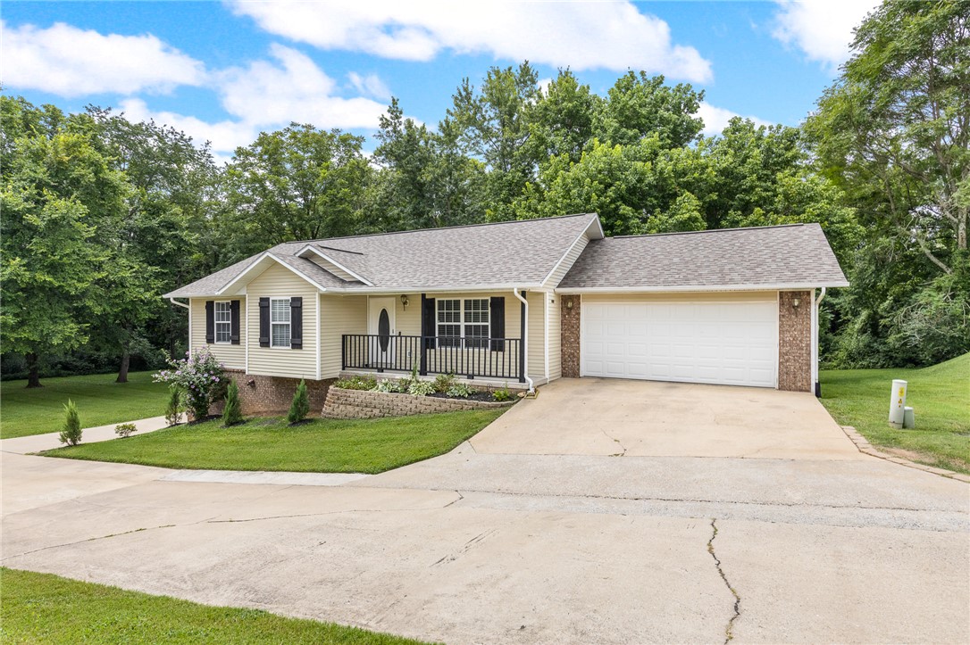Discover the perfect blend of comfort, convenience, and versatility in this beautifully updated 4-bedroom, 3-bath home. Thoughtfully designed for modern living, this property is move-in ready. Ideal for multi-generational living, the home boasts a spacious  handicap accessible walk-out basement complete with its own garage making it perfect for an extended family, guests, or added privacy. The workshop area in the basement garage provides the perfect space for hobbies, storage, or projects. Step outside and enjoy access with a private gated entry to scenic walking and biking trails, as well as a dog park making it perfect for staying active and enjoying the outdoors. No more hassle and upkeep with mowing. This home includes. maintenance, of your lawn, giving you more time to relax and enjoy your home. With its flexible layout, and desirable amenities, this home offers something for everyone whether you're entertaining, working, or simply enjoying everyday​​‌​​​​‌​‌​​​‌‌​​​‌‌‌​​‌​​‌‌​​​​ living.