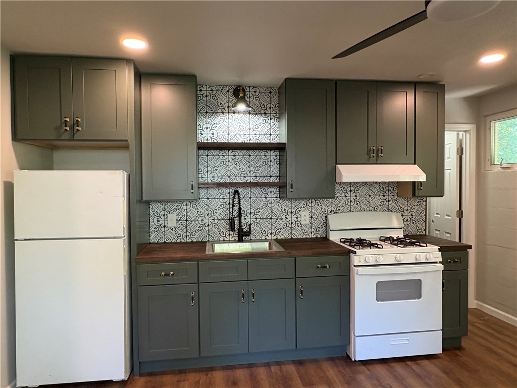Remodeled apartment in Downtown Art District, across from Blair Library, next to trails, walking distance to Dickson St. and Fayetteville square.  Apartment has washer dryer and off-street parking.