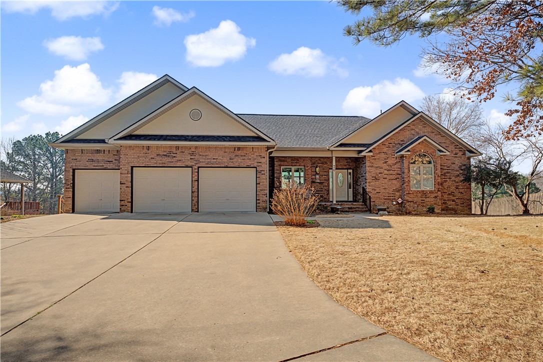 Perched atop the 12th green of the prestigious Scotsdale Golf Course, this exceptional golf-front home delivers sweeping views and an unbeatable Bella Vista lifestyle. Featuring 3 bedrooms, 2 full bathrooms and 2 half baths, plus a spacious two-level design, this home offers room to spread out and enjoy every season. The inviting screened porch is the perfect place to relax and take in the picturesque setting, while the 3-car garage and dedicated workshop provide abundant storage and space for hobbies. Prime location close to some of Bella Vista’s best mountain biking trails, golf, and outdoor recreation. Major updates include all new windows for improved efficiency and comfort. Whether you’re entertaining guests, enjoying peaceful mornings overlooking the course, or exploring the nearby trails, this home combines scenic beauty, functionality, and location into one incredible opportunity. This home has been pre-inspected and is in pristine condition. Stop waiting...this is your chance to own something special!