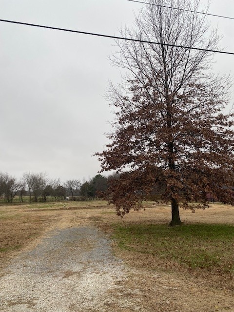 Existing septic system on site, new water meter on site, easy access to I49, Farmington Public Schools. Site Improvements complete and template home plans available to buyer at no additional cost. Site surveyed for future detached shop building.