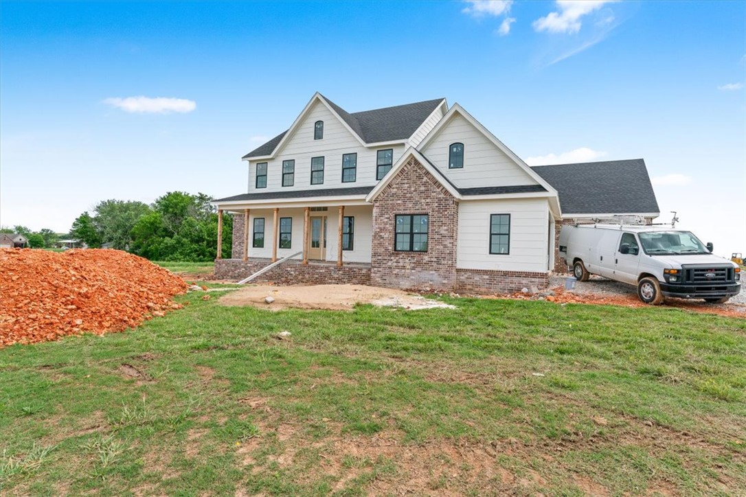 Look forward to coming home to Springdale newest Subdivision, Magnolia Meadows off Harmon Rd
Fayetteville Address, Springdale Schools, near Tontitown. One acre lots, 3 car garage, 3200 - 3800 sq ft
homes planned. Just getting started but this home has 5 bedrooms, 4.5 bathrooms, study and media room. Front porch, back deck and all the space you need. Sprinkler system will be installed for the sodded areas of the yard as well.  Come check it out.