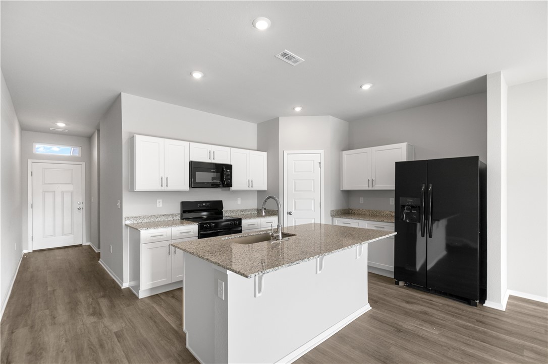 Discover your Next Home nestled in a lively, newly developed community! This property boasts 4 generous bedrooms and 2 bathrooms, offering plenty of room for families or visitors. The welcoming open-concept design effortlessly merges the living, dining, and kitchen spaces, ideal for hosting gatherings. The master suite stands out with its walk-in closet and abundant natural light. Plus, with a handy two-car garage, you'll have all the storage you require. Embrace modern comfort and elegance —your ideal haven to call home!