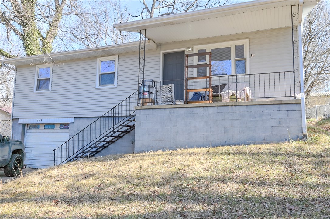 Charming and well-located home in the heart of Harrison! This property offers convenient access to downtown, schools, shopping, and local amenities while sitting in an established neighborhood. Inside, you’ll find a functional layout with comfortable living spaces, abundant natural light, and plenty of potential to make it your own. The kitchen provides ample cabinet space and flows nicely into the main living area, making it ideal for everyday living or entertaining. Outside, enjoy a manageable yard with room for gardening, pets, or outdoor relaxation. Whether you're a first-time buyer, downsizing, or looking for an investment opportunity, this property checks all the boxes for location, value, and potential. Don’t miss your chance to own a solid home in a convenient Harrison location!