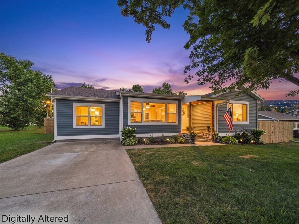 This delightful home was completely remodeled in 2020. New vinyl flooring for common areas in 2026. Split floor plan, private primary bedroom with large soaking tub and beautiful tile. All bedrooms are large with high efficiency windows for natural light. Open floor plan living area, bright kitchen with high end 3cm granite, cabinets with brass gold and 3cm countertops in two full baths and half bath. Additional family room play space upstairs. Updated and upgraded electrical and plumbing. Attached workspace and storage area. Large lot over 1/4 acre. Close to everything: 1 mile to biking greenway, 1.5 miles to downtown Rogers and Railyard, and 10 minutes to Pinnacle Promenade.