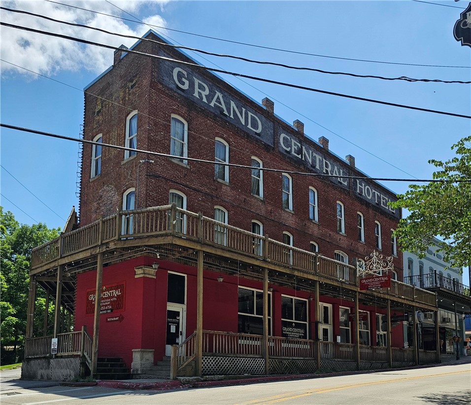 The Grand Hotel has 15 unites each with its own parking, 2 are doubles that is currently being used as overnight lodging or could be used as long term lodging. Main level has a restaurant, Tavern (not currently open) and 1 unit that can be living quarters. Lowest level is open space and can be retail, office, flea market or more lodging. Cross listed mls#1346850 and mls#1346773.