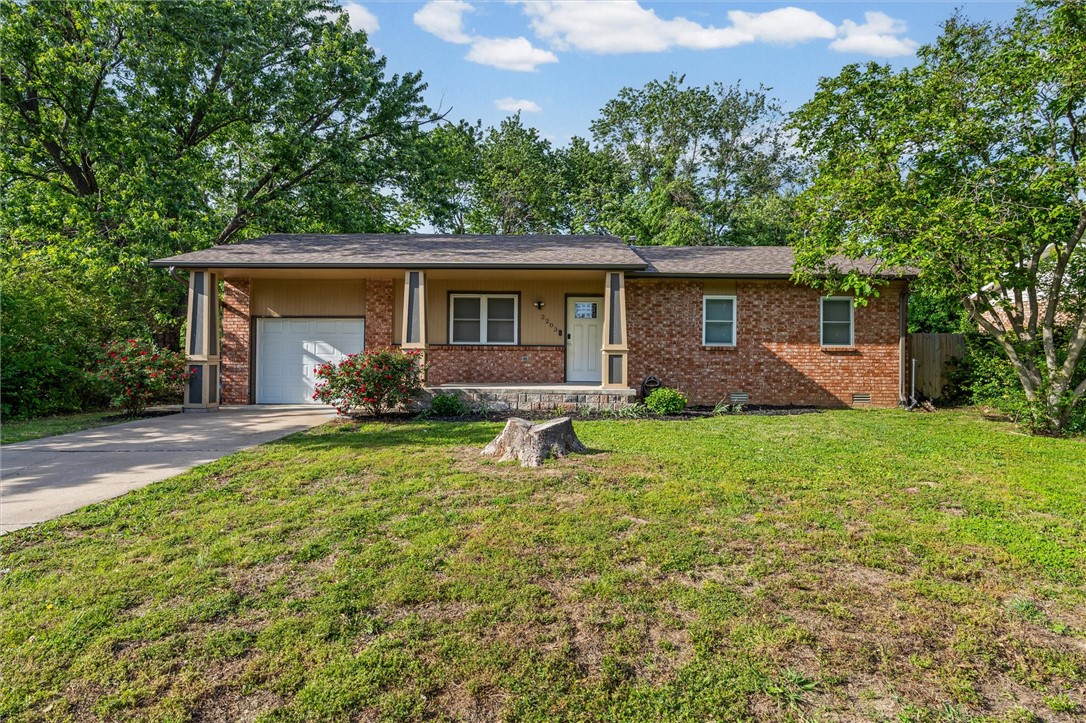 Welcome to 2203 Beth Lane — a beautifully remodeled home in the heart of Bentonville, offering comfort, style, and an UNBEATABLE location. This 2-bedroom, 1-bath property features modern finishes, solid surface flooring throughout, and a functional layout with an inviting eat-in kitchen ideal for everyday living and entertaining.

Located just minutes from the new Walmart Home Office campus, you’ll enjoy convenient access to everything Bentonville has to offer. Nearby Downtown Bentonville features Crystal Bridges Museum, The Momentary, and a vibrant mix of dining, shopping, and entertainment.

Outdoor enthusiasts will love easy access to the Razorback Greenway and Bentonville’s renowned mountain biking trails. The spacious lot offers room to relax, garden, or entertain. With quick access to I-49, schools, and daily conveniences, this home is well-suited for first-time buyers, professionals, or investors seeking short- or long-term rental or corporate housing opportunities.